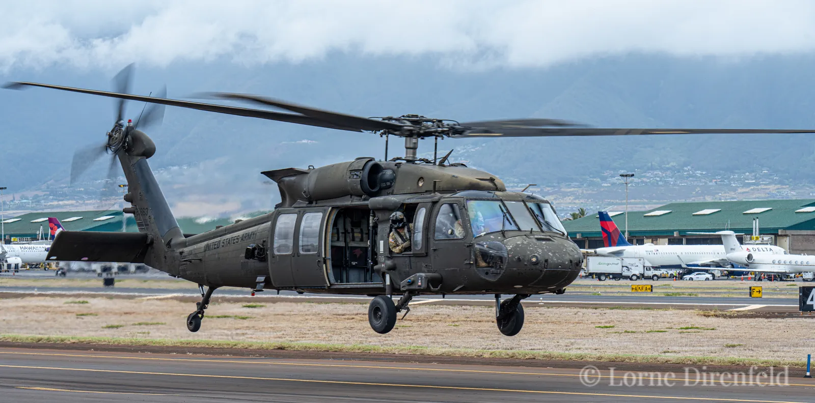 Sikorsky UH-60 Black Hawk helicopters accompanied President Biden on his visit to Maui . . .