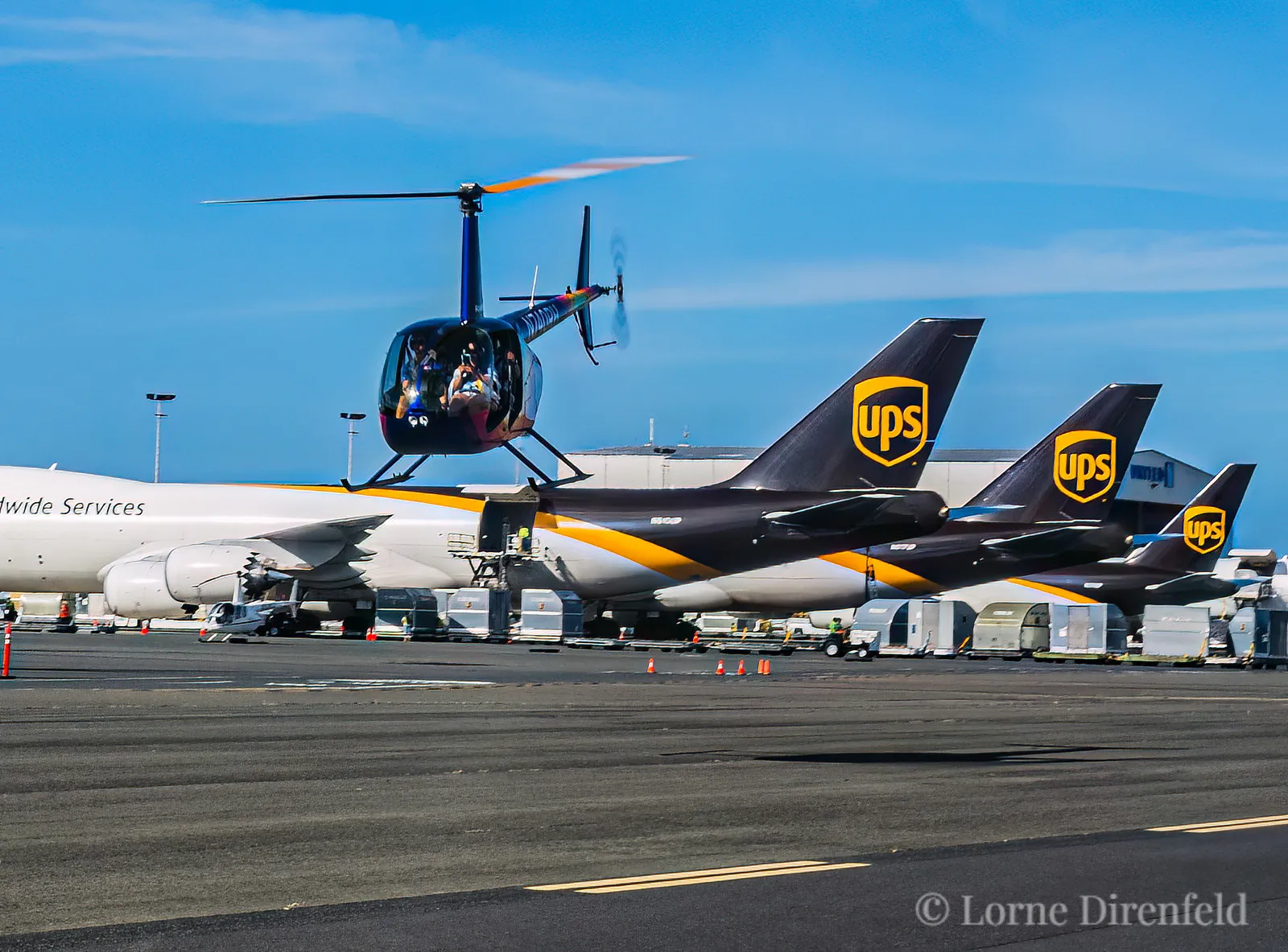 Coming in to land after a Robinson R44 helicopter tour flight of Oahu . . .