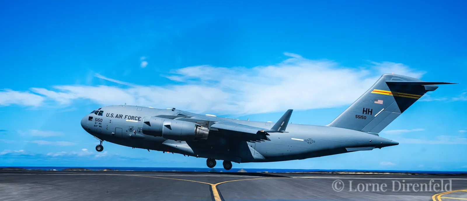 One of my favorite airplanes, the C17 Globemaster III, a real power lifter . . .

The "HH" on the tail refers to Joint Base Pearl Harbor Hickam and the Airlift Squadron.