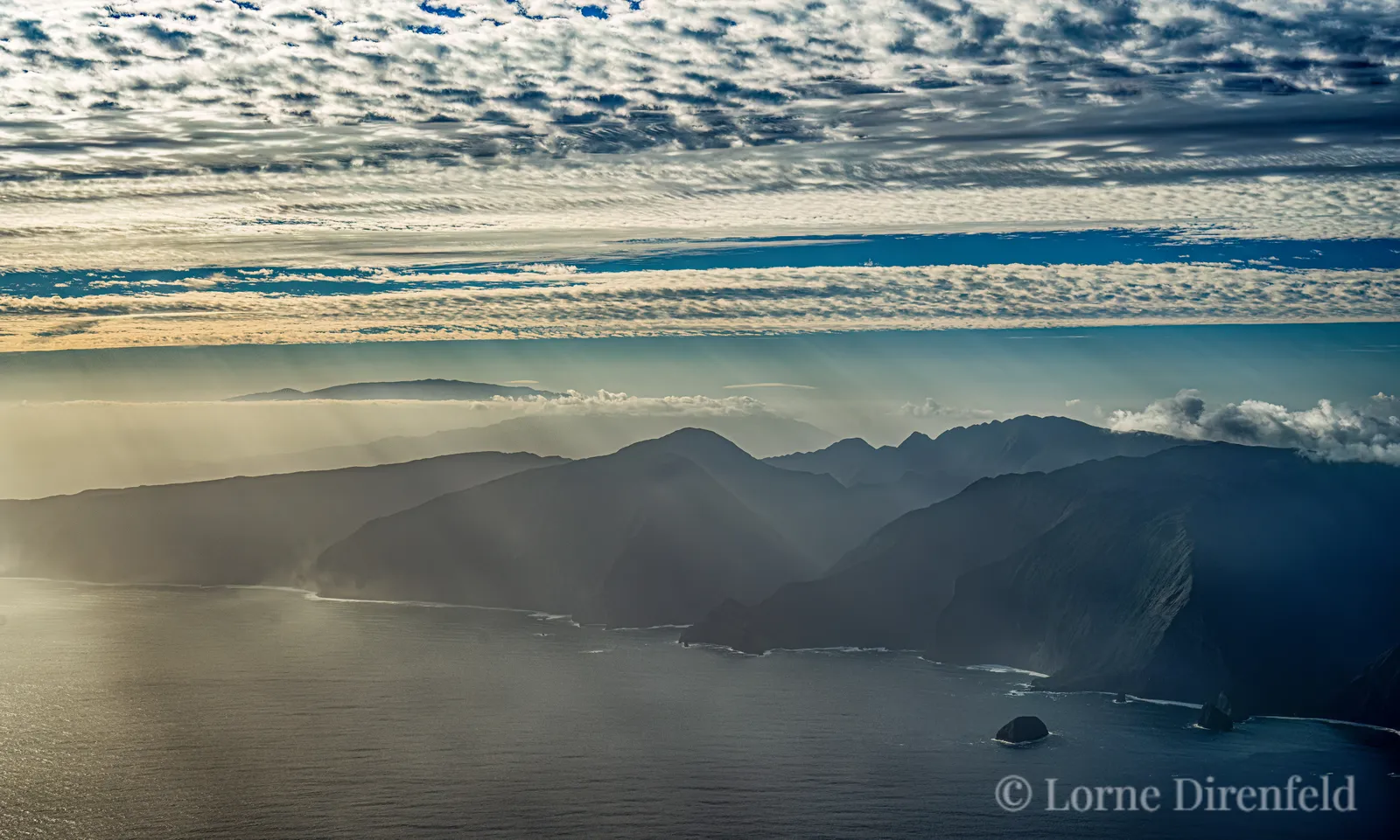 North shore Molokai, tallest sea cliffs in the world, in the early morning light . . .