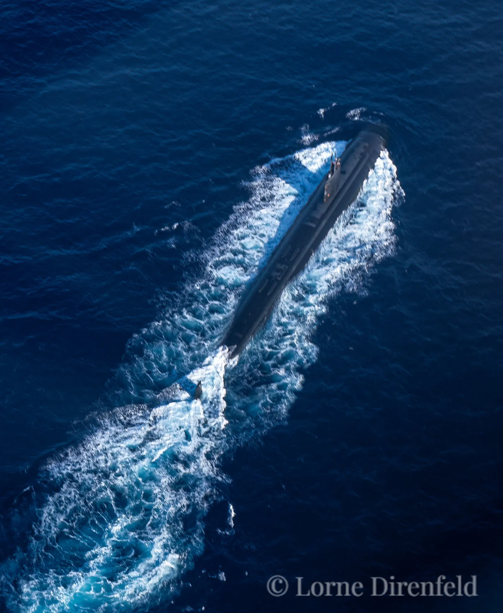 Pearl Harbor is the home of 18 nuclear submarines. When leaving or arriving, they surface or dive far off-shore, out of sight of land. When armed with nuclear weapons, they are accompanied in and out of the harbor by military helicopters . . .